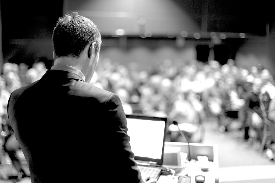 Male speaker at a conference