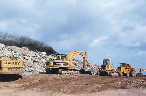 Oakley Plant mini diggers and bulldozers excavating a site ready for construction