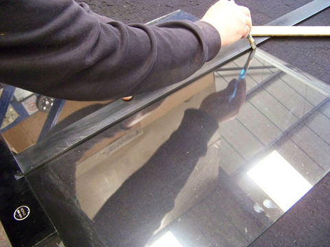 Glass being cut to size