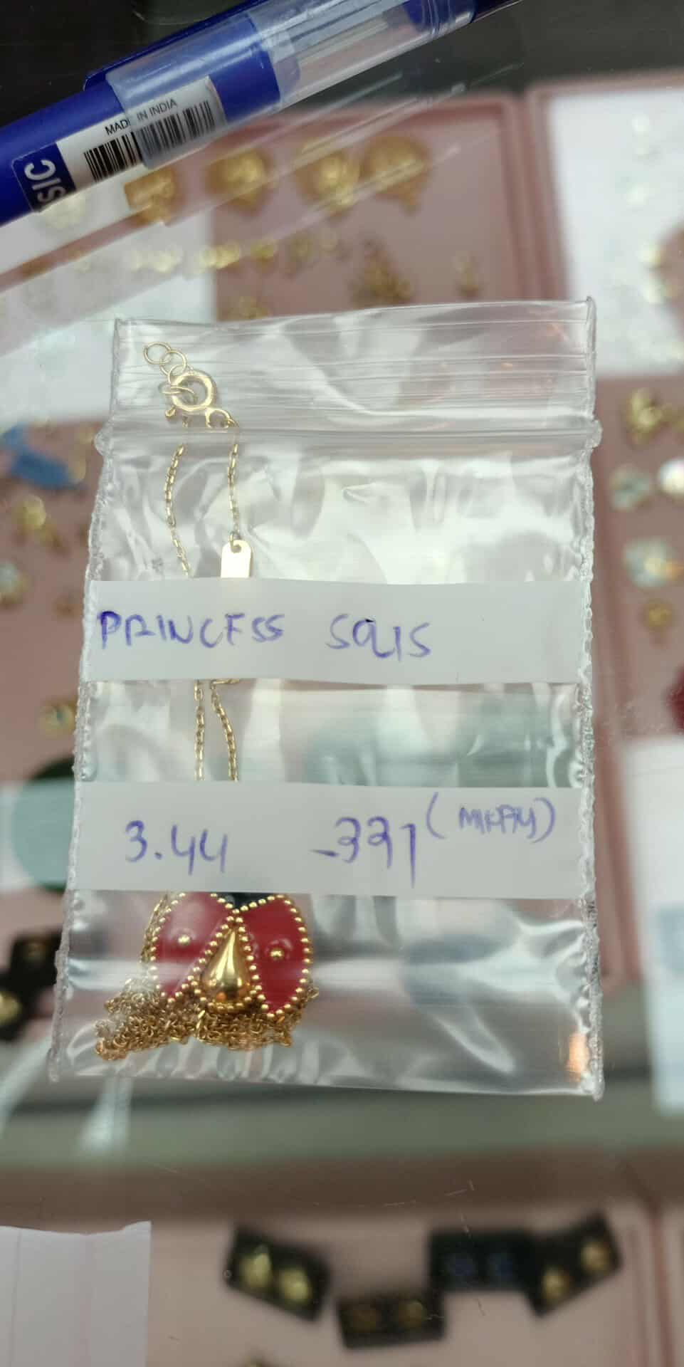 18K LADY BUG NECKLACE 