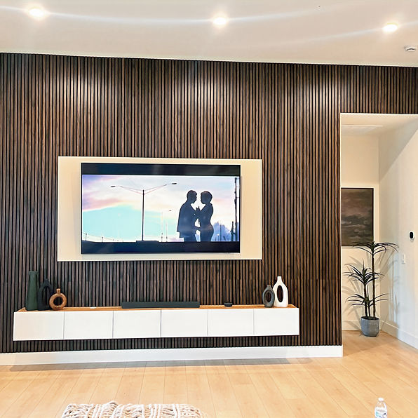 Modern architectural wall panel installation in Turlock, CA by Caliber Home Repairs. Features precision-aligned geometric panels with a clean, contemporary finish.