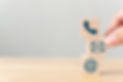 hand-putting-wooden-block-cube-symbol-telephone-email-address.jpg
