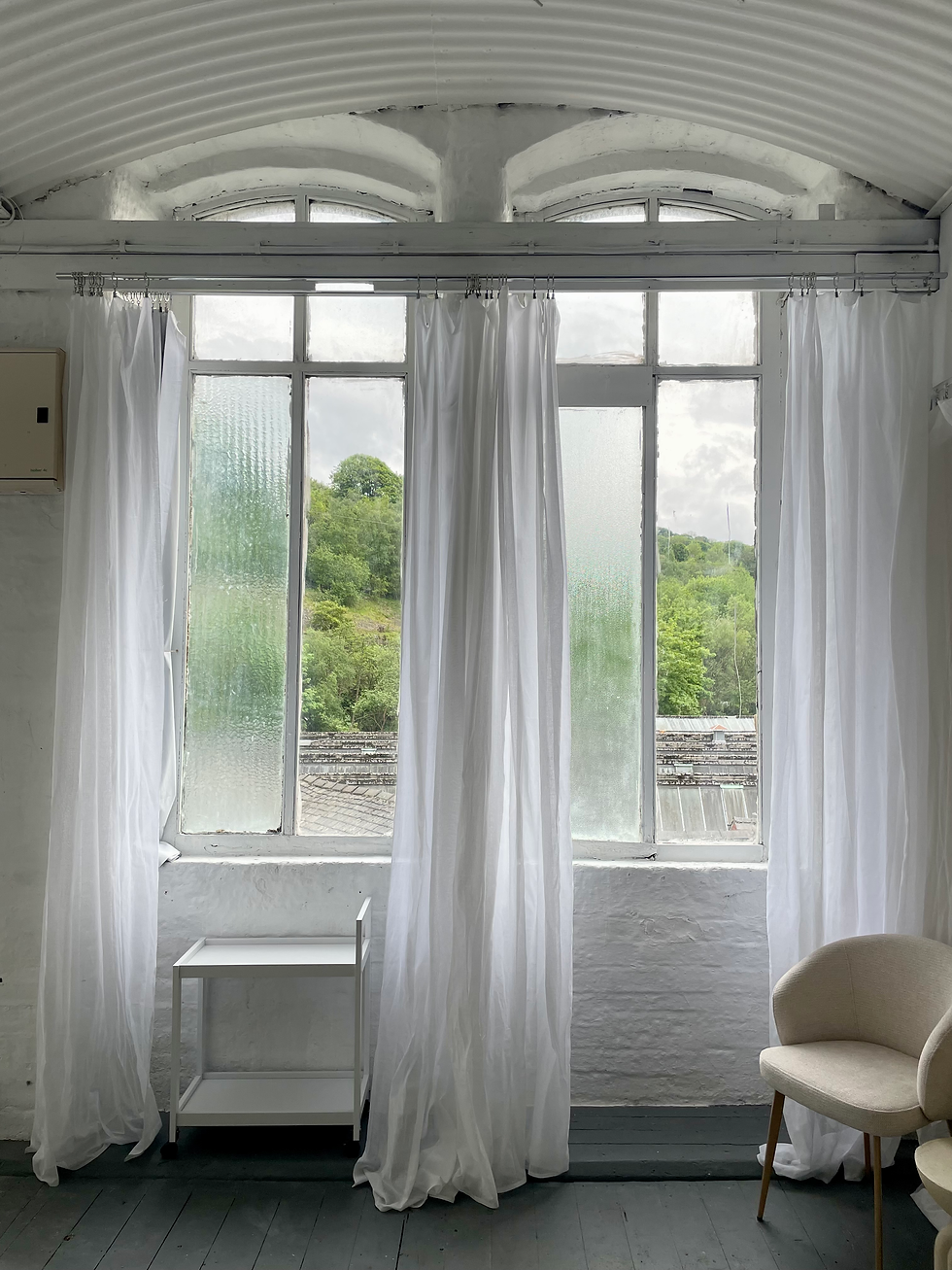 Bright studio with white curtains, ideal for photography & content in Halifax