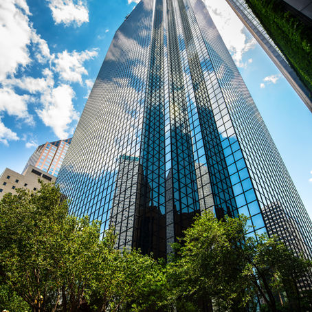 Woods Capital Assumes Management of Thanksgiving Tower