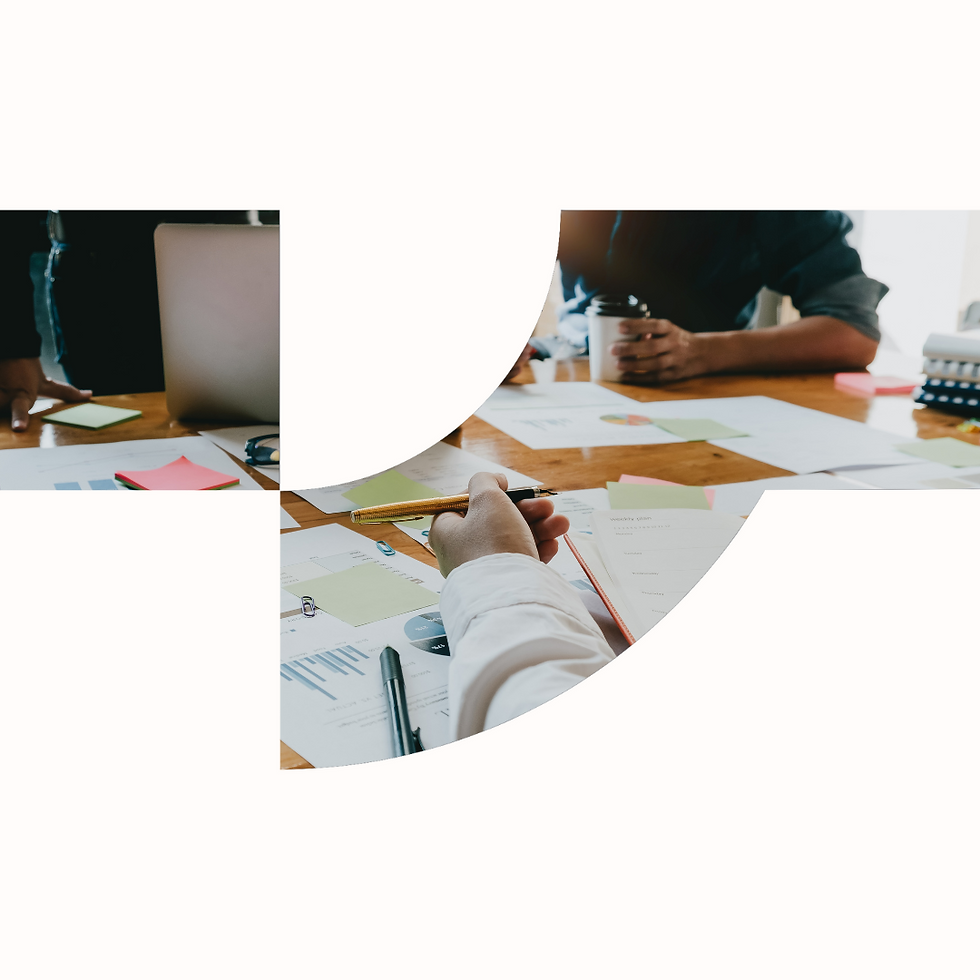 a venture foundry brand icon on a light background in front of an image of people sitting around a desk