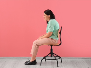 How does sitting impact posture?