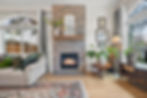 stonebridge-custom-builders-living-room-stone-fireplace-wood-mantel-meridian-idaho.jpg