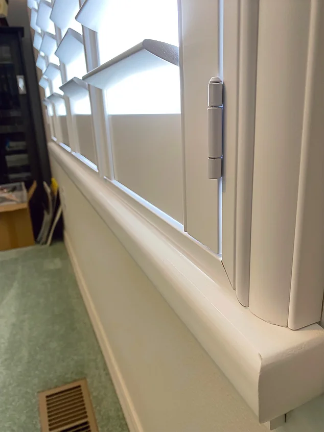Shutters Sill Cap - The sill cap was added on top of the existing sill because the shutter was mounted outside of the window casing