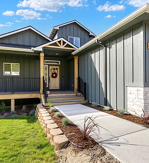 stonebridge-custom-builders-craftsman-home-front-entry-board-batten-star-idaho.jpg