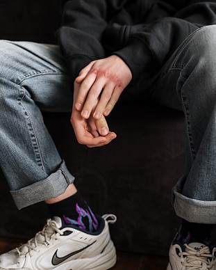 person-in-blue-denim-jeans-and-purple-an