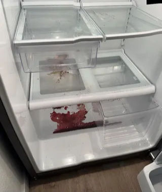 Clean refrigerator interior with crisper drawers