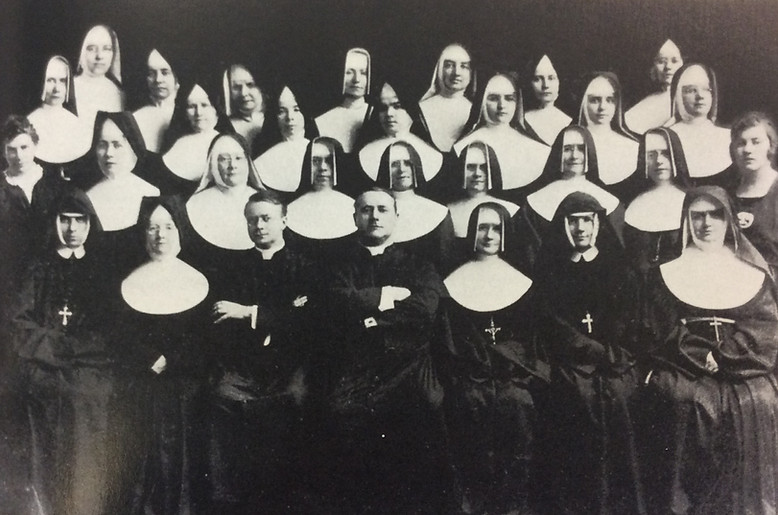 hallahan first faculty.jpeg