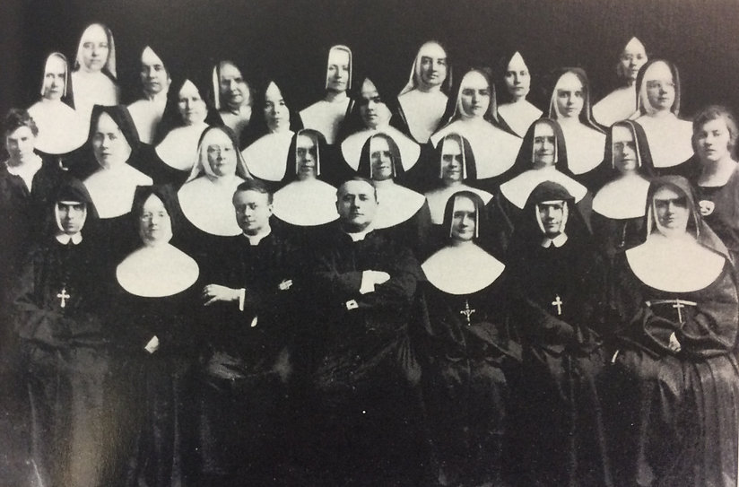 hallahan first faculty.jpeg