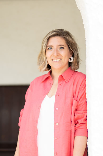 Clemmie, a doula and hypnobirthing teacher, smiling warmly, symbolising supportive and empowering care.