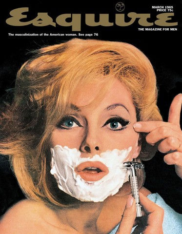A woman shaves her face like a man
