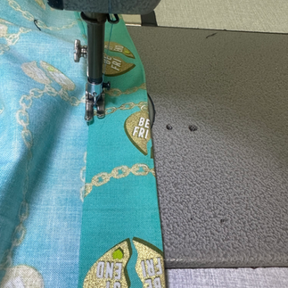 worming ribbon into tube