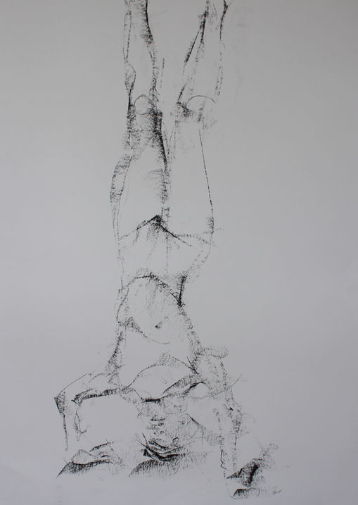 A black and white charcoal drawing of a woman doing a headstand