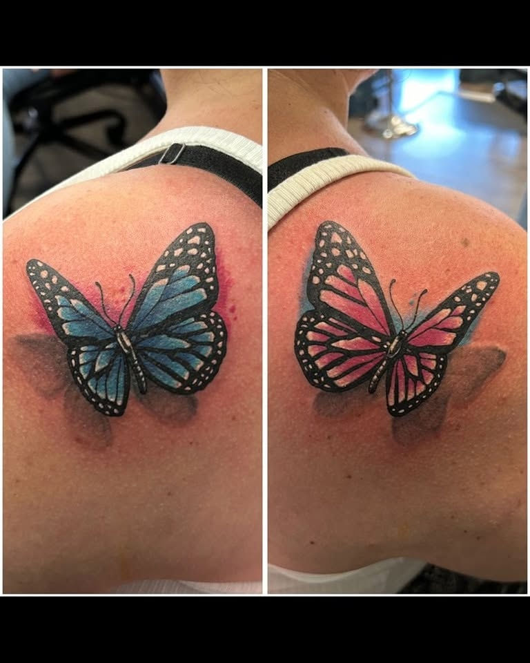Matching colour butterfly tattoos on shoulder blades by Abbie Cadaverous at Studio28