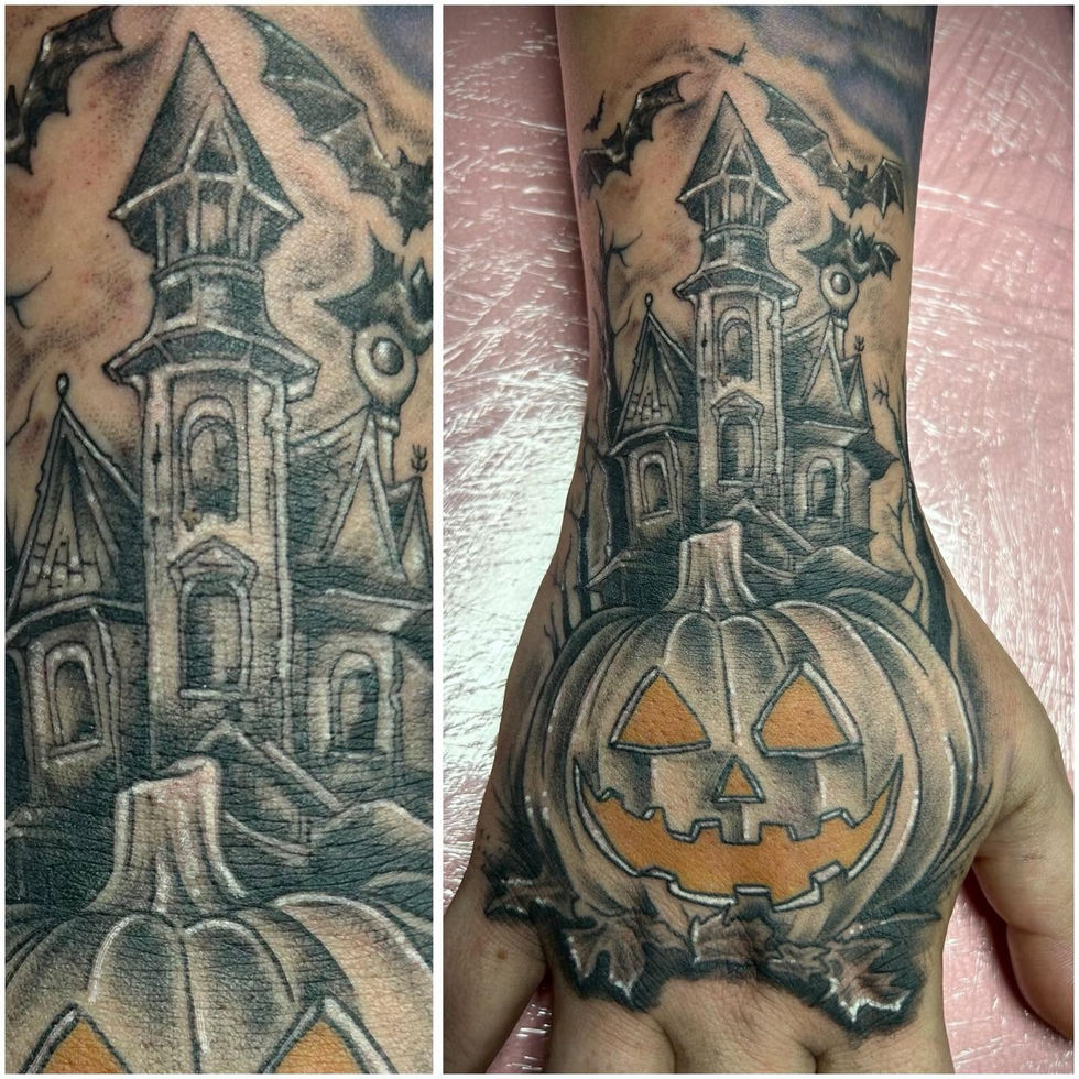 Haunted house and jack-o'-lantern tattoo on hand by Hayley Crystal Ink at Studio28