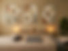 Massage room with art, towels, candles, and serene atmosphere, Energy Healing.