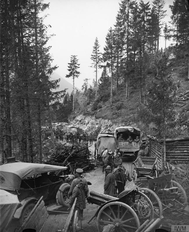 Source: Wikipedia. Italian and British troops passing abandoned Austro-Hungarian artillery on the Val d'Assa mountain road, 2 November 1918