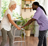 male-social-worker-taking-care-old-woman.jpg