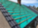 Roof under renovation with materials