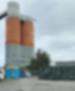 Industrial building with storage containers