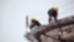 Welding construction worker on building