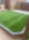 Artificial green lawn area