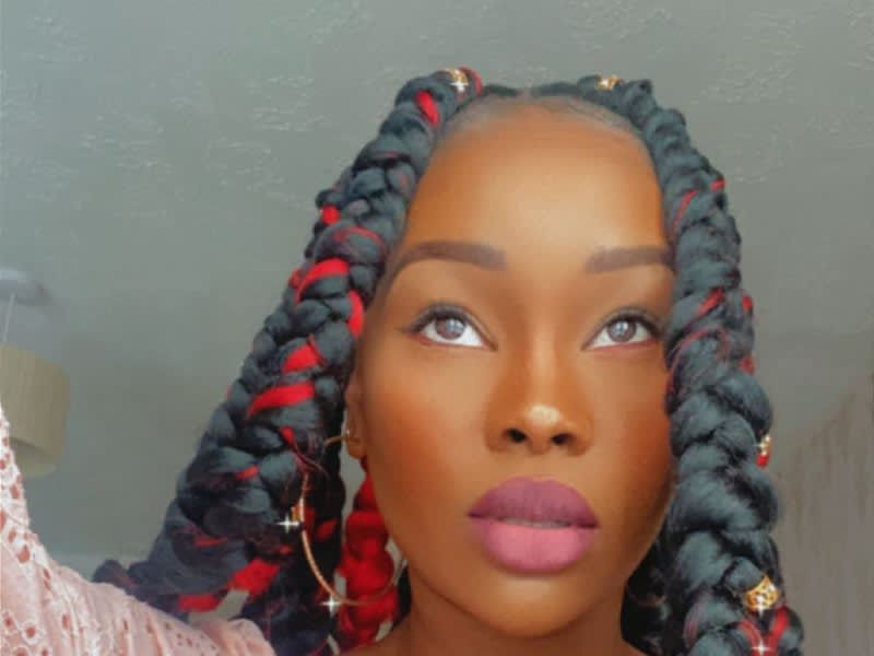 Woman with braided hairstyle