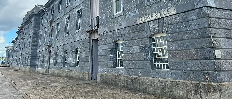 Historic stone building with overcast sky