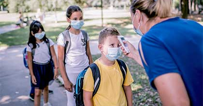 school-nurse-checking-temperature.jpg