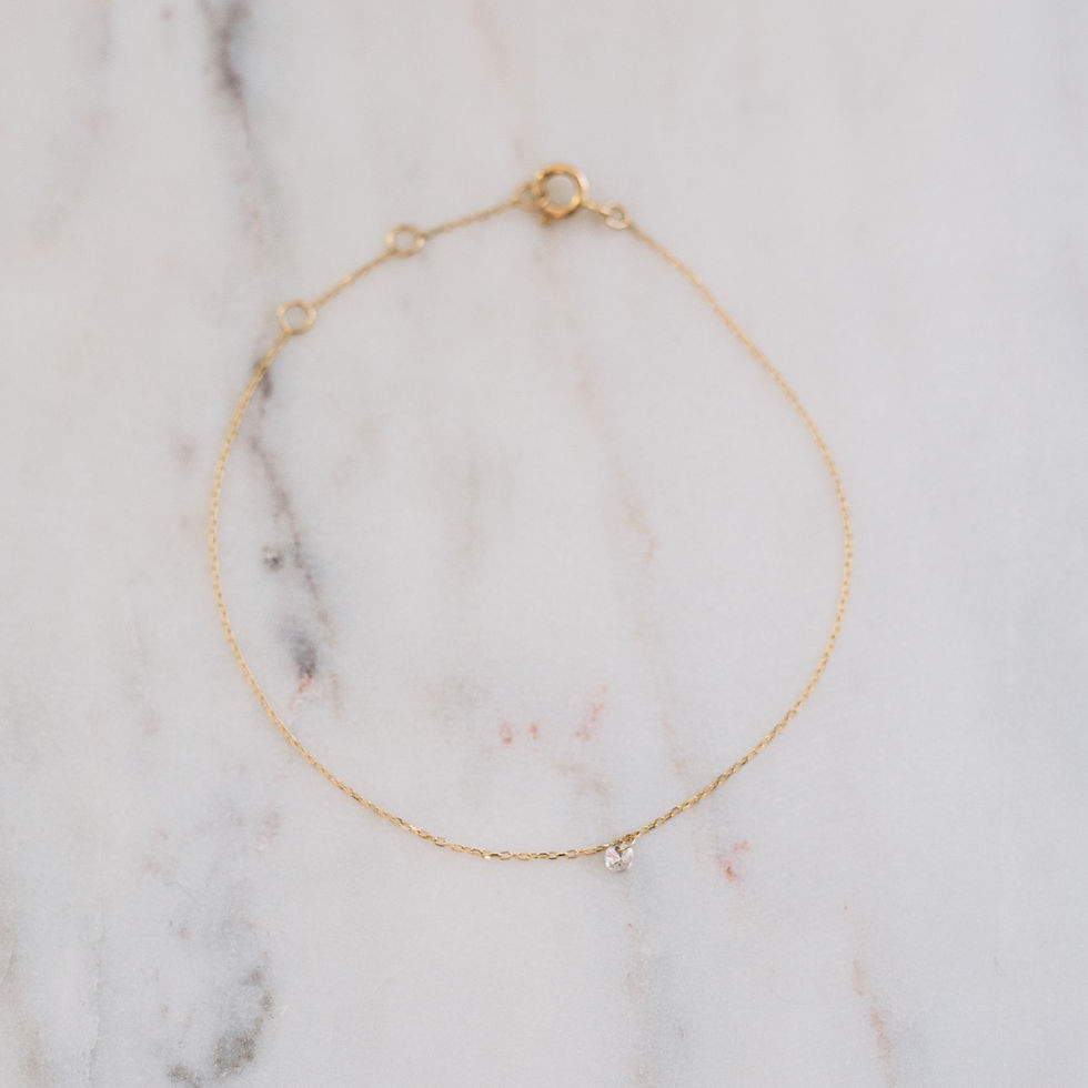 Delicate gold bracelet with tiny diamonds