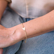 Diamond Tennis bracelet with an Engravable Gold Heart