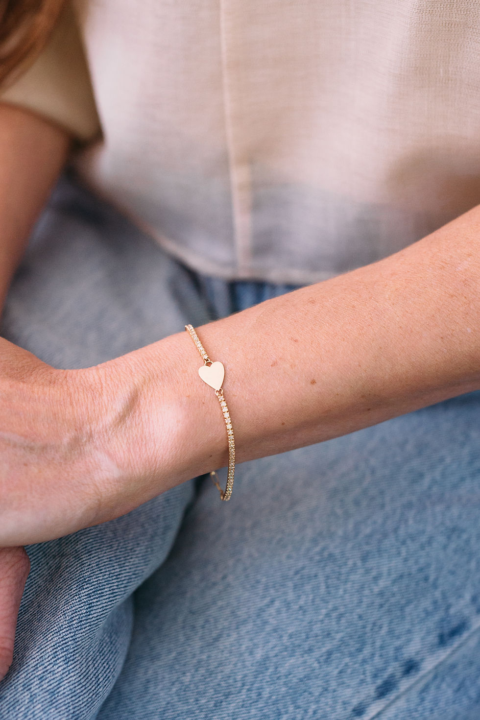 Diamond Tennis bracelet with an Engravable Gold Heart