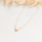 Delicate gold star necklace