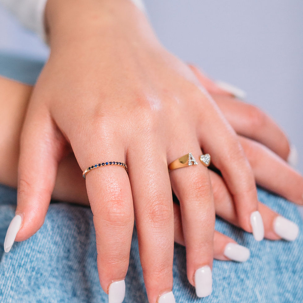 Woman's hands with delicate rings