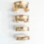 Four gold cuff bracelets, various sizes