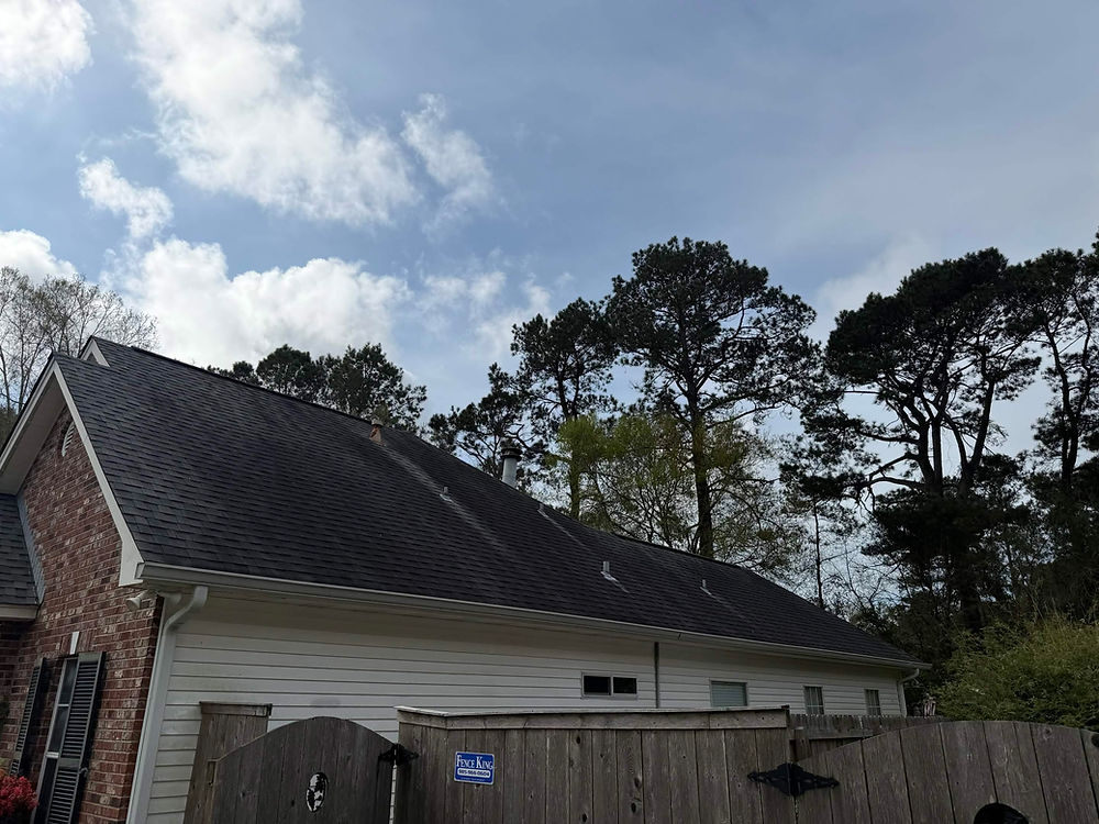 Dirty roof on a house, needing exterior cleaning results