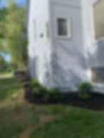 Residential landscaping with mulch and plants in Olathe KS