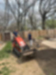 Landscaping project in Olathe KS with mini loader and raking