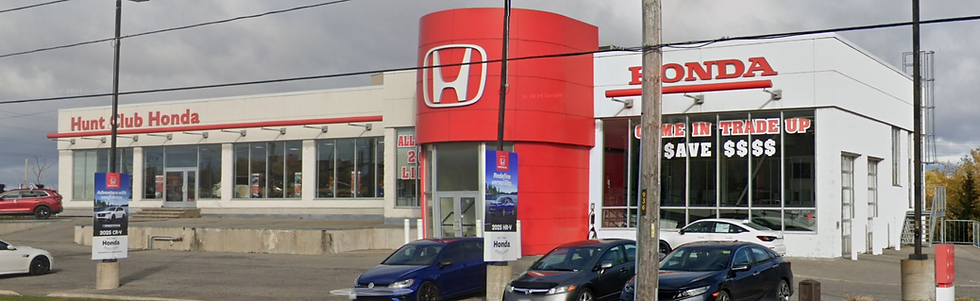 Interior painting and renovation project at Hunt Club Honda in Ottawa, featuring a bright automotive showroom, clean painted walls, modern service bay areas, glass partitions, vehicle display spaces, customer lounge, and professional commercial finishes.