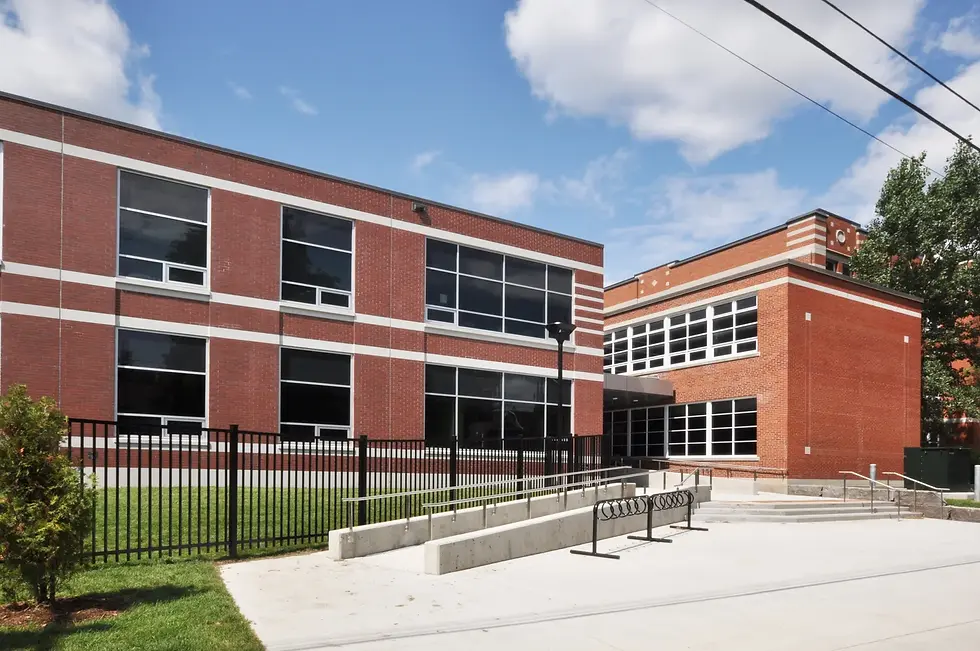 Interior painting project at Elmdale Public School in Ottawa, featuring refreshed school corridors, classrooms, common areas, clean painted walls, detailed trim work, and a professional finish within a historic educational building.