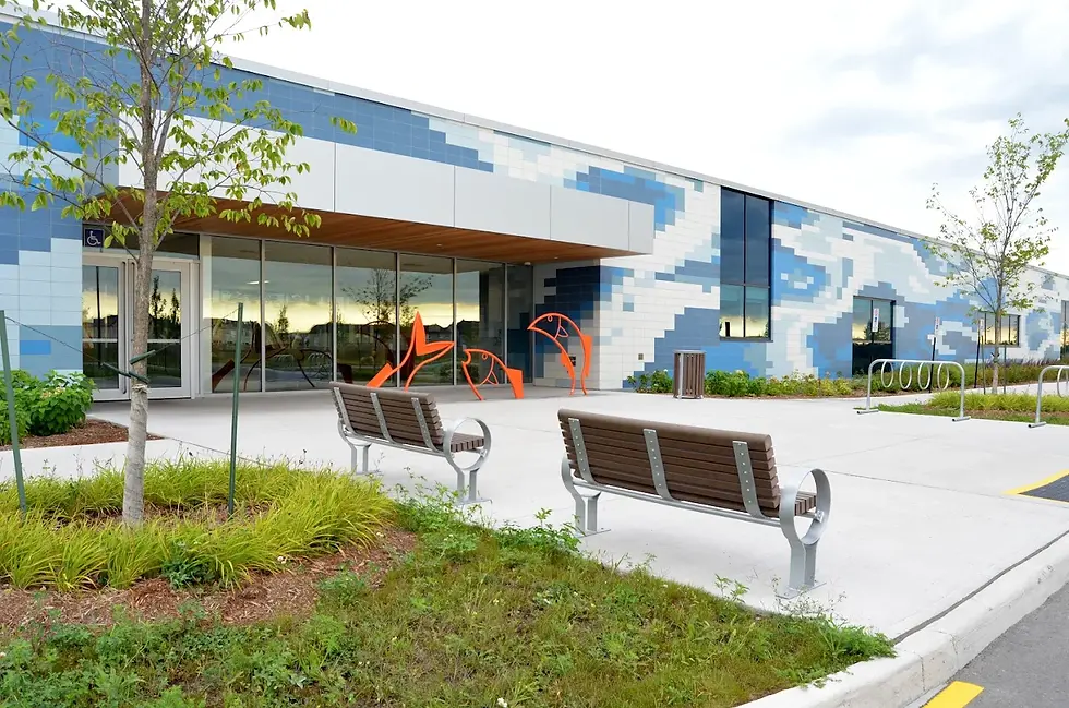 Interior view of the François Dupuis Recreation Centre in Ottawa, showing the pool area, gymnasium, corridors, fitness spaces, and freshly painted recreational interiors.
