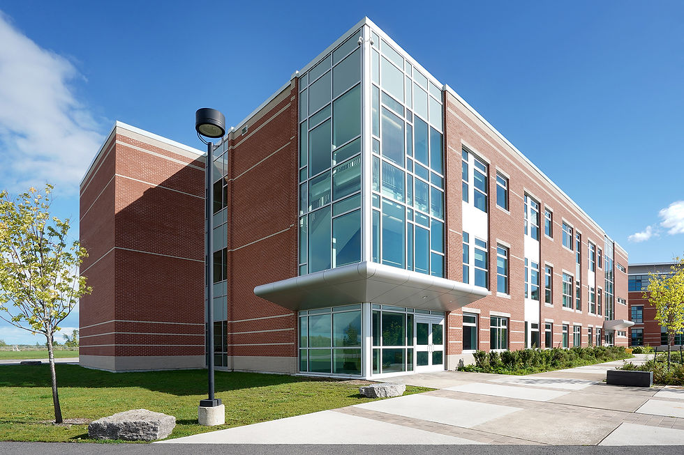 Interior painting project at St. Francis Xavier Catholic High School in Gloucester, featuring refreshed atrium areas, gymnasium, learning commons, chapel, classrooms, corridors, stairwells, wood shop, painted walls, ceilings, doors, trims, and professional school finishes.