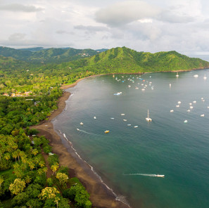 Playa del Coco beach from the air drone shot