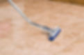 Tile and grout cleaning with a professional wand tool removing dirt from grout lines in a Louisville home.