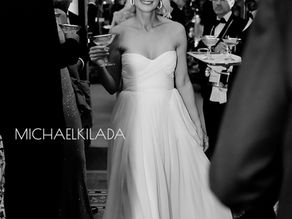 woman in bridal gown holding champagne glass