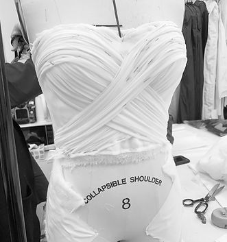 Draping detail of a strapless silk bodice
